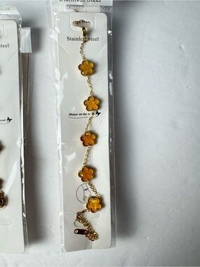 Gold Flower Charm Bracelet with Brown Accents